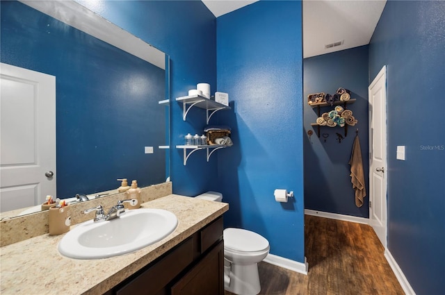 4662 Osprey Way, Winter Haven, FL 33881 - bathroom featuring wood finished floors and vanity