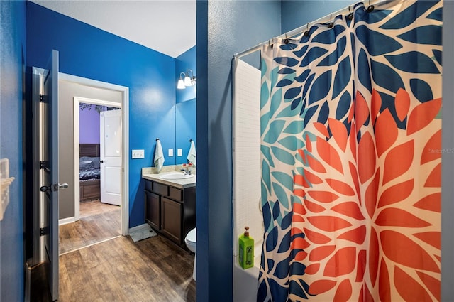 4662 Osprey Way, Winter Haven, FL 33881 - full bath with wood finished floors, vanity, shower / bath combo, and connected bathroom