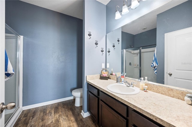 4662 Osprey Way, Winter Haven, FL 33881 - bathroom with a stall shower, vanity, and wood finished floors