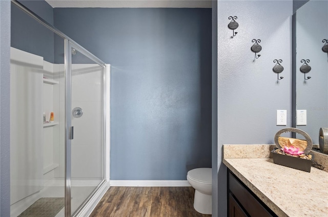 4662 Osprey Way, Winter Haven, FL 33881 - bathroom with a stall shower, vanity, and wood finished floors