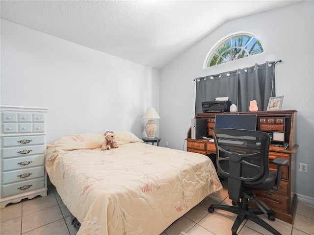 2538 Crown Ridge Cir, Kissimmee, FL 34744 - bedroom featuring lofted ceiling, light tile patterned flooring, and an office area