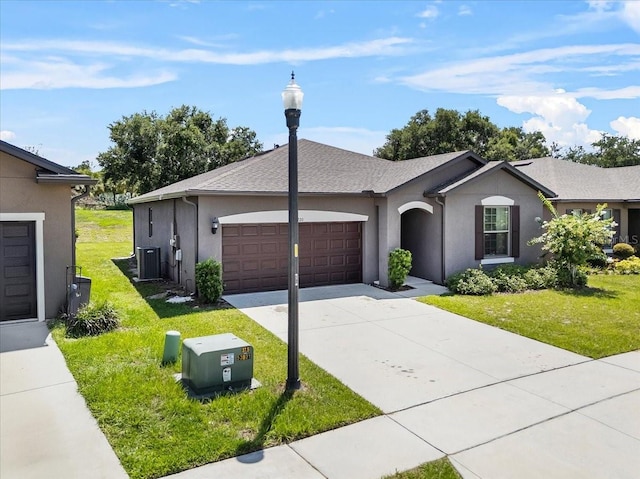 8720 Micmac Ct, Polk City, FL 33868 - single story home featuring a front lawn, stucco siding, driveway, and a garage