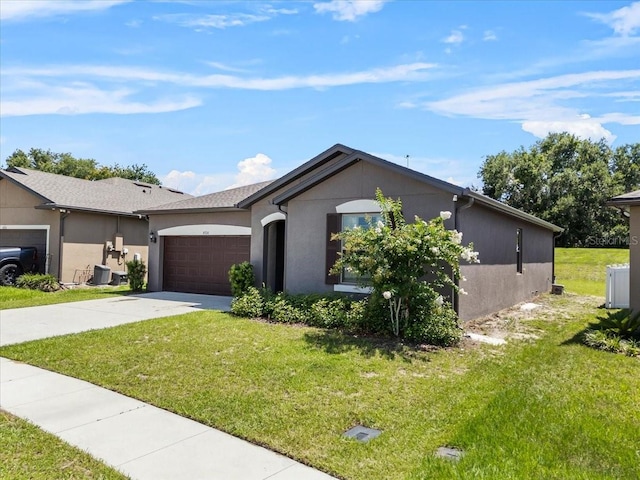 8720 Micmac Ct, Polk City, FL 33868 - ranch-style house featuring concrete driveway, a garage, stucco siding, and a front lawn