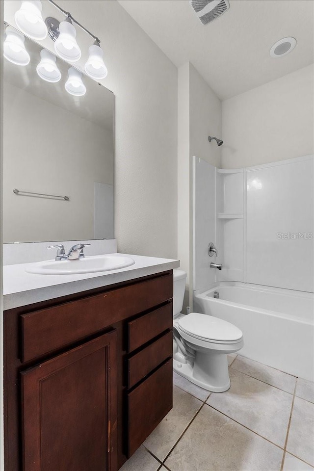 8720 Micmac Ct, Polk City, FL 33868 - full bath with tile patterned floors, vanity, and bathtub / shower combination