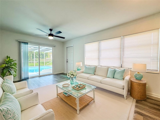 938 Glenwood Ave, Sebring, FL 33870 - living room with wood finished floors and a ceiling fan
