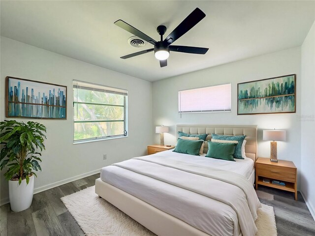 938 Glenwood Ave, Sebring, FL 33870 - bedroom featuring wood finished floors and a ceiling fan