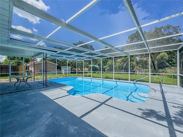 938 Glenwood Ave, Sebring, FL 33870 - view of swimming pool featuring a patio, a shed, and glass enclosure