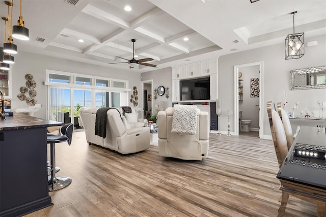 545 Pond Cypress Ct, Auburndale, FL 33823 - living room with ceiling fan, wood finished floors, coffered ceiling, beam ceiling, and recessed lighting