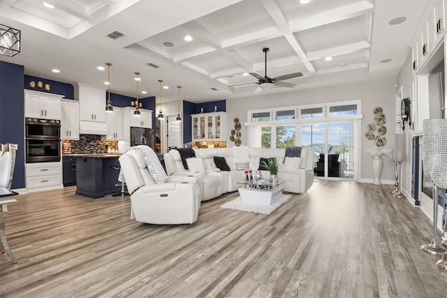 545 Pond Cypress Ct, Auburndale, FL 33823 - living area featuring coffered ceiling, ceiling fan, light wood-style flooring, beam ceiling, and recessed lighting
