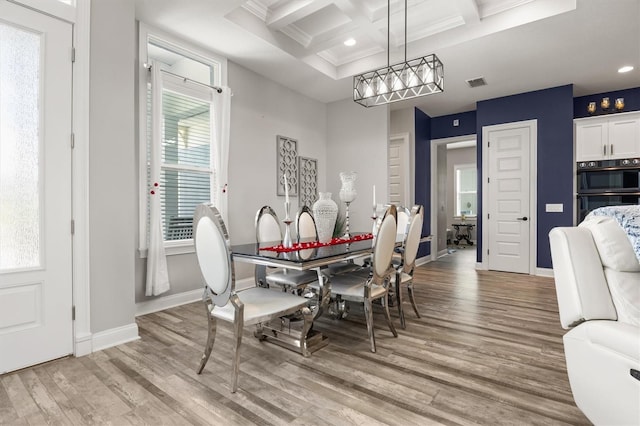 545 Pond Cypress Ct, Auburndale, FL 33823 - dining area featuring coffered ceiling, wood finished floors, beam ceiling, recessed lighting, and ornamental molding