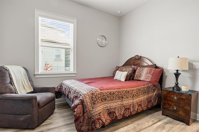 545 Pond Cypress Ct, Auburndale, FL 33823 - bedroom featuring light wood-style floors and baseboards