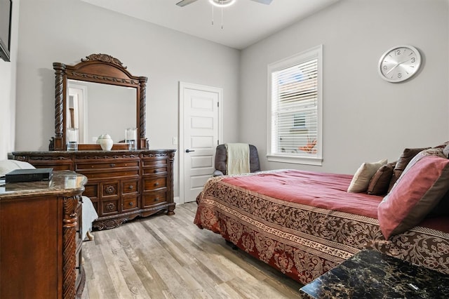 545 Pond Cypress Ct, Auburndale, FL 33823 - bedroom featuring light wood-type flooring and ceiling fan