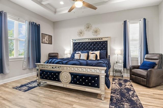 545 Pond Cypress Ct, Auburndale, FL 33823 - bedroom featuring wood finished floors, a ceiling fan, crown molding, beamed ceiling, and coffered ceiling