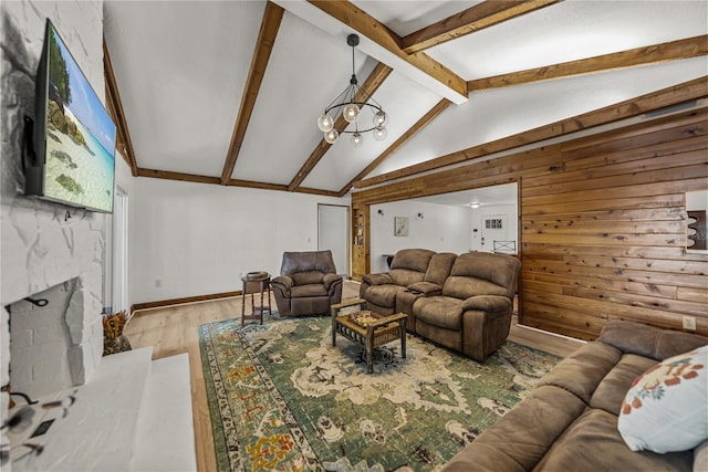 914 Mangham Rd, Babson Park, FL 33827 - living area featuring wooden walls, a chandelier, and wood finished floors