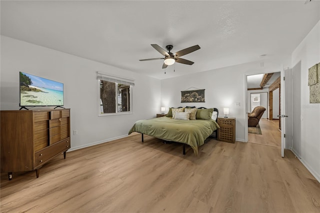 914 Mangham Rd, Babson Park, FL 33827 - bedroom with light wood finished floors and ceiling fan