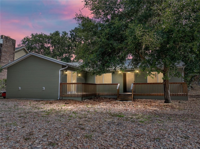 914 Mangham Rd, Babson Park, FL 33827 - back of property at dusk featuring a chimney