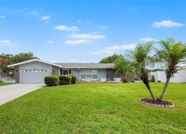 611 Caddy Dr, Kissimmee, FL 34759 - single story home featuring an attached garage, driveway, and stucco siding