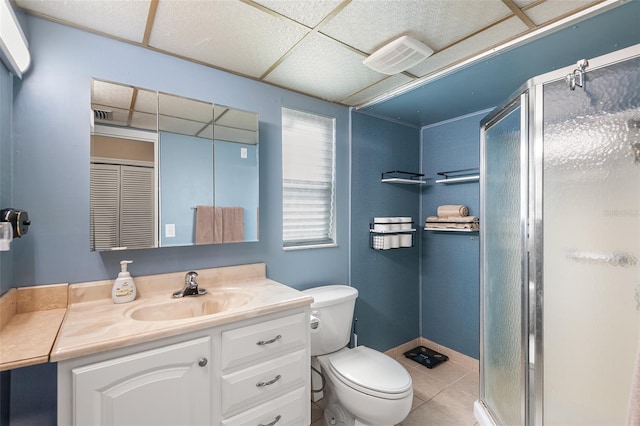 611 Caddy Dr, Kissimmee, FL 34759 - bathroom with vanity, a stall shower, and tile patterned floors