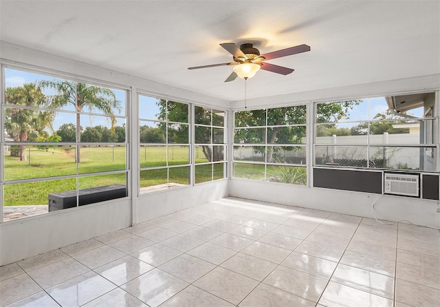 611 Caddy Dr, Kissimmee, FL 34759 - unfurnished sunroom featuring ceiling fan and cooling unit