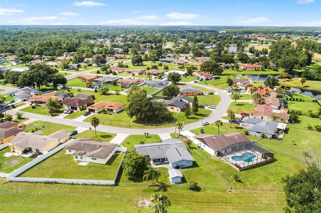 611 Caddy Dr, Kissimmee, FL 34759 - aerial perspective of suburban area with a large body of water