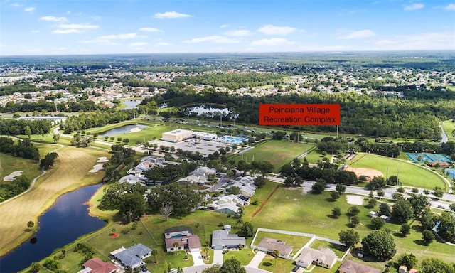 611 Caddy Dr, Kissimmee, FL 34759 - view of property location with a large body of water, nearby suburban area, and a golf course