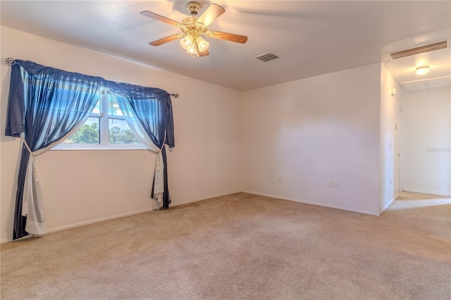 2125 Hillcrest Rd, Auburndale, FL 33823 - carpeted spare room with attic access and a ceiling fan