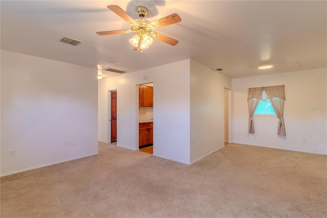 2125 Hillcrest Rd, Auburndale, FL 33823 - empty room featuring a ceiling fan and light carpet