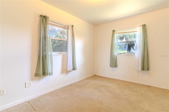2125 Hillcrest Rd, Auburndale, FL 33823 - empty room featuring healthy amount of natural light and carpet floors