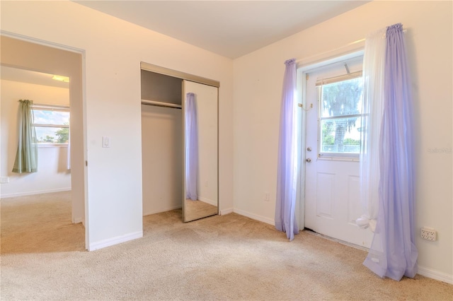 2125 Hillcrest Rd, Auburndale, FL 33823 - unfurnished bedroom featuring carpet floors and a closet