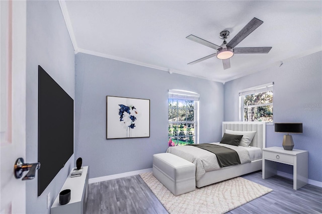 1823 N Olivia Dr, Avon Park, FL 33825 - bedroom with wood finished floors, ornamental molding, and ceiling fan