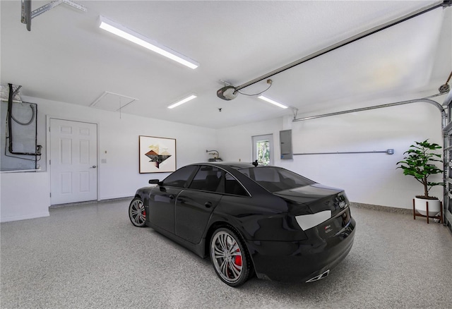1823 N Olivia Dr, Avon Park, FL 33825 - garage with electric panel and a garage door opener