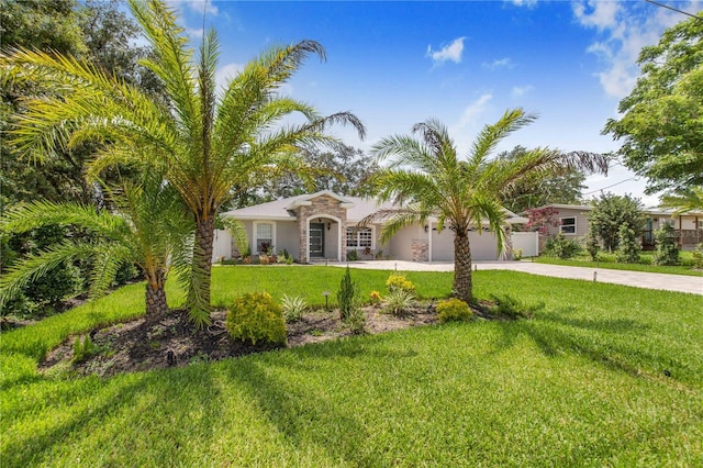 1823 N Olivia Dr, Avon Park, FL 33825 - view of front facade with driveway, a garage, stone siding, a front lawn, and stucco siding