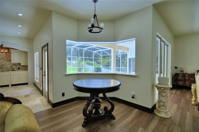 10708 Belo Horizonte Ave, Clermont, FL 34711 - entrance foyer with a sunroom, healthy amount of natural light, light wood-style floors, and recessed lighting