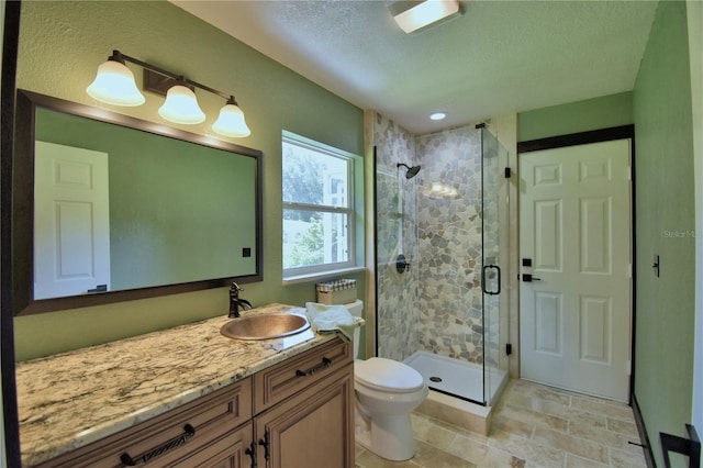 10708 Belo Horizonte Ave, Clermont, FL 34711 - full bath featuring a stall shower, vanity, a textured ceiling, and stone finish flooring