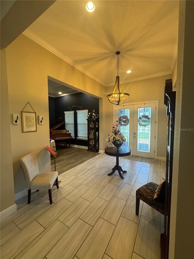 25863 Crossings Bluff Ln, Sorrento, FL 32776 - foyer featuring a chandelier, crown molding, a textured ceiling, wood tiled floors, and recessed lighting