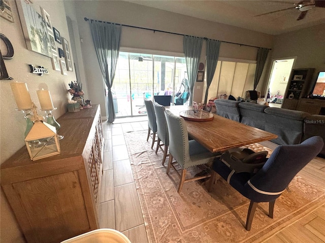 25863 Crossings Bluff Ln, Sorrento, FL 32776 - dining room featuring a ceiling fan and light wood-style flooring