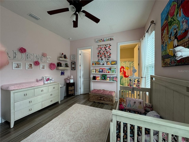 25863 Crossings Bluff Ln, Sorrento, FL 32776 - bedroom with wood finished floors, a textured ceiling, and ceiling fan