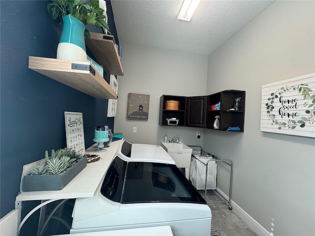 25863 Crossings Bluff Ln, Sorrento, FL 32776 - laundry area with separate washer and dryer and a textured ceiling