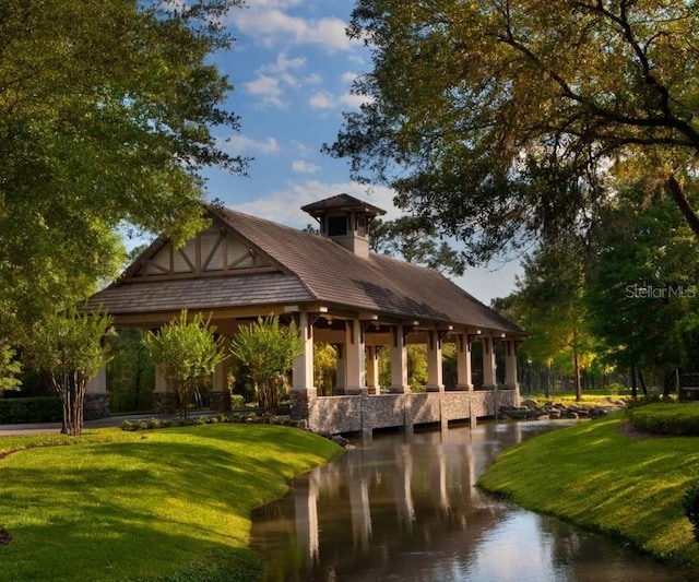 25863 Crossings Bluff Ln, Sorrento, FL 32776 - view of community featuring a lawn and a water view