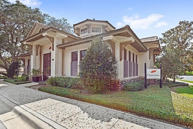 25863 Crossings Bluff Ln, Sorrento, FL 32776 - view of front of home featuring stucco siding