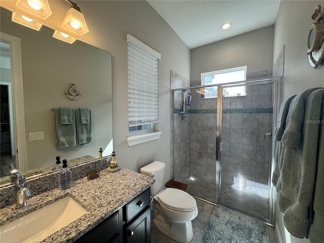25863 Crossings Bluff Ln, Sorrento, FL 32776 - bathroom featuring vanity, a shower stall, and tile patterned flooring