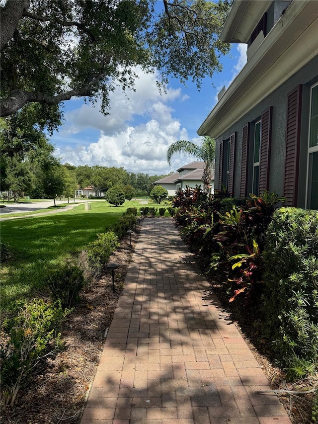25863 Crossings Bluff Ln, Sorrento, FL 32776 - view of property's community with a yard
