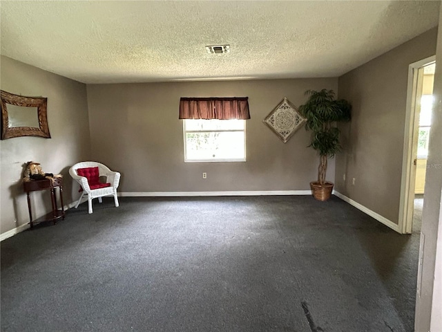 5101 Transport Rd, Bartow, FL 33830 - unfurnished room featuring dark carpet and a textured ceiling