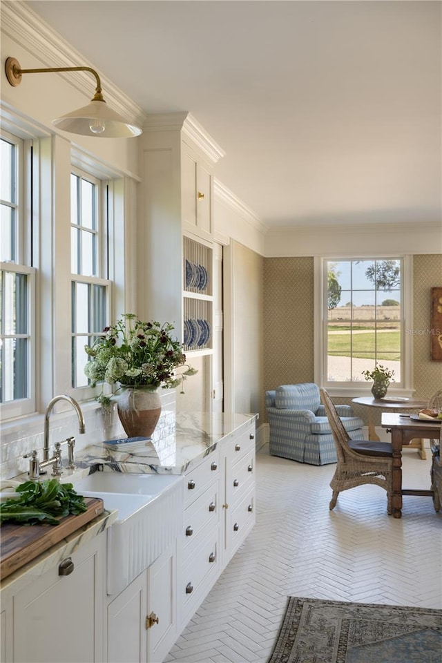 2300 Scenic Hwy N Unit 51, Lake Wales, FL 33898 - kitchen featuring white cabinets, open floor plan, and light stone counters