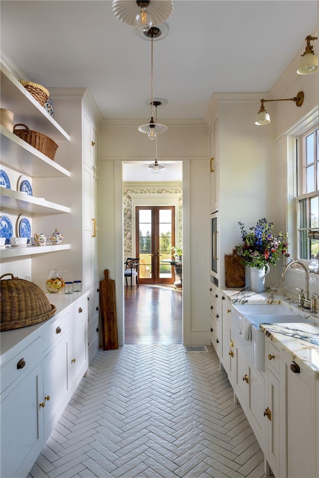 2300 Scenic Hwy N Unit 51, Lake Wales, FL 33898 - interior space featuring crown molding, french doors, and decorative light fixtures
