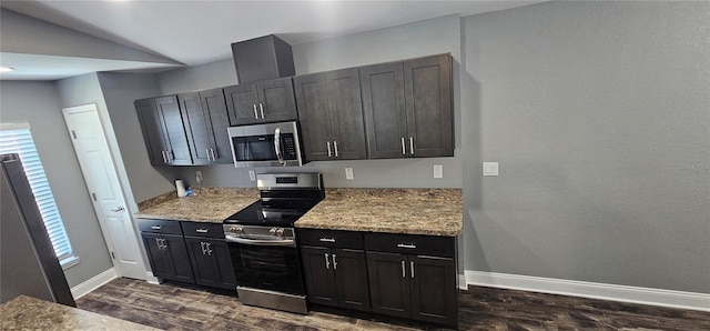1318 Herschell St, Lakeland, FL 33815 - kitchen featuring appliances with stainless steel finishes and dark wood-style flooring