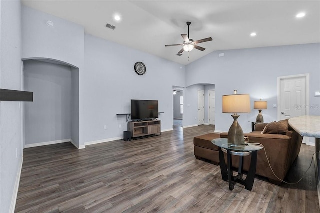 910 Blue Tide Ln, Lakeland, FL 33809 - living room featuring arched walkways, a ceiling fan, wood finished floors, high vaulted ceiling, and recessed lighting