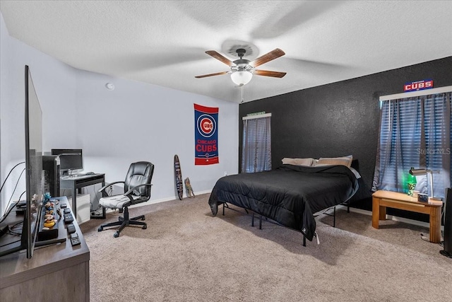 910 Blue Tide Ln, Lakeland, FL 33809 - carpeted bedroom with a textured ceiling and ceiling fan