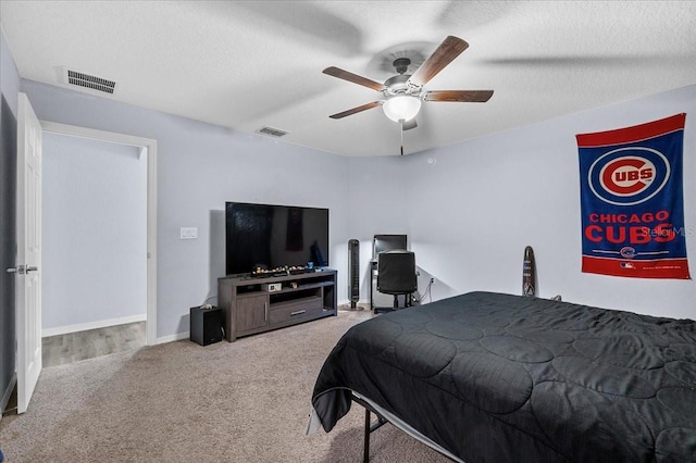 910 Blue Tide Ln, Lakeland, FL 33809 - carpeted bedroom featuring a ceiling fan and a textured ceiling