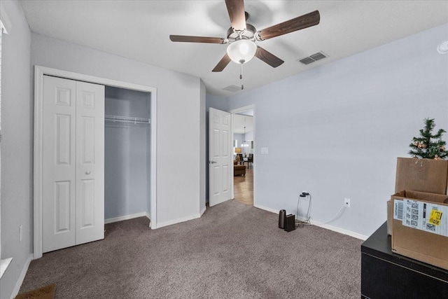 910 Blue Tide Ln, Lakeland, FL 33809 - unfurnished bedroom with carpet flooring, a closet, and ceiling fan